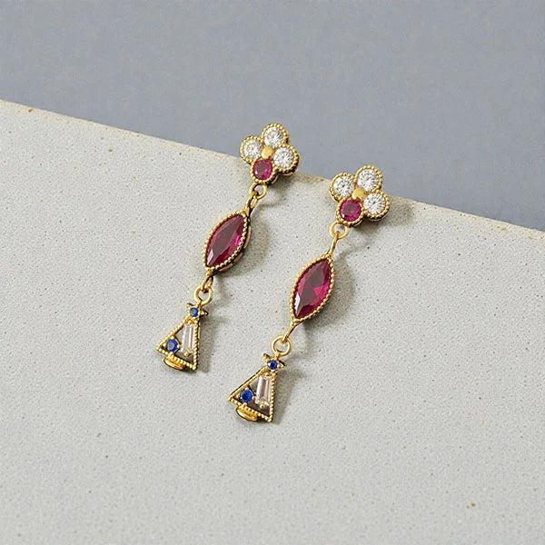 Boucles d'oreilles pendantes dorées à l'or fin 24 carats