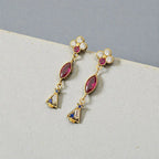 Boucles d'oreilles pendantes dorées à l'or fin 24 carats