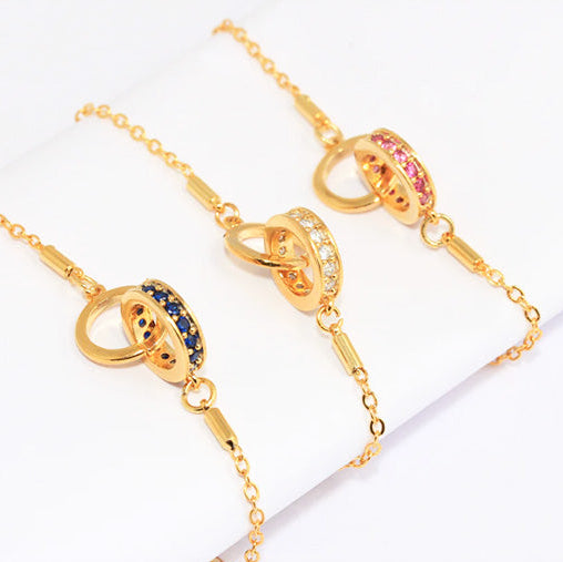 Représentation des rois bracelets à bélières : rubis, émeraude et blanc