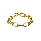 bracelet femme à maillons ovales doré à l'or fin 24 carats sur fond blanc