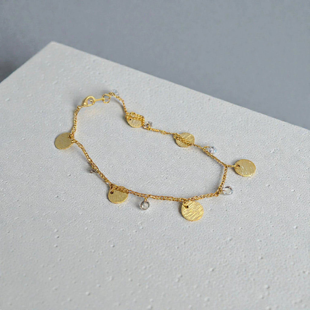 représentation du bracelet de cheville-monnaie