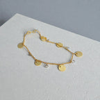 représentation du bracelet de cheville-monnaie