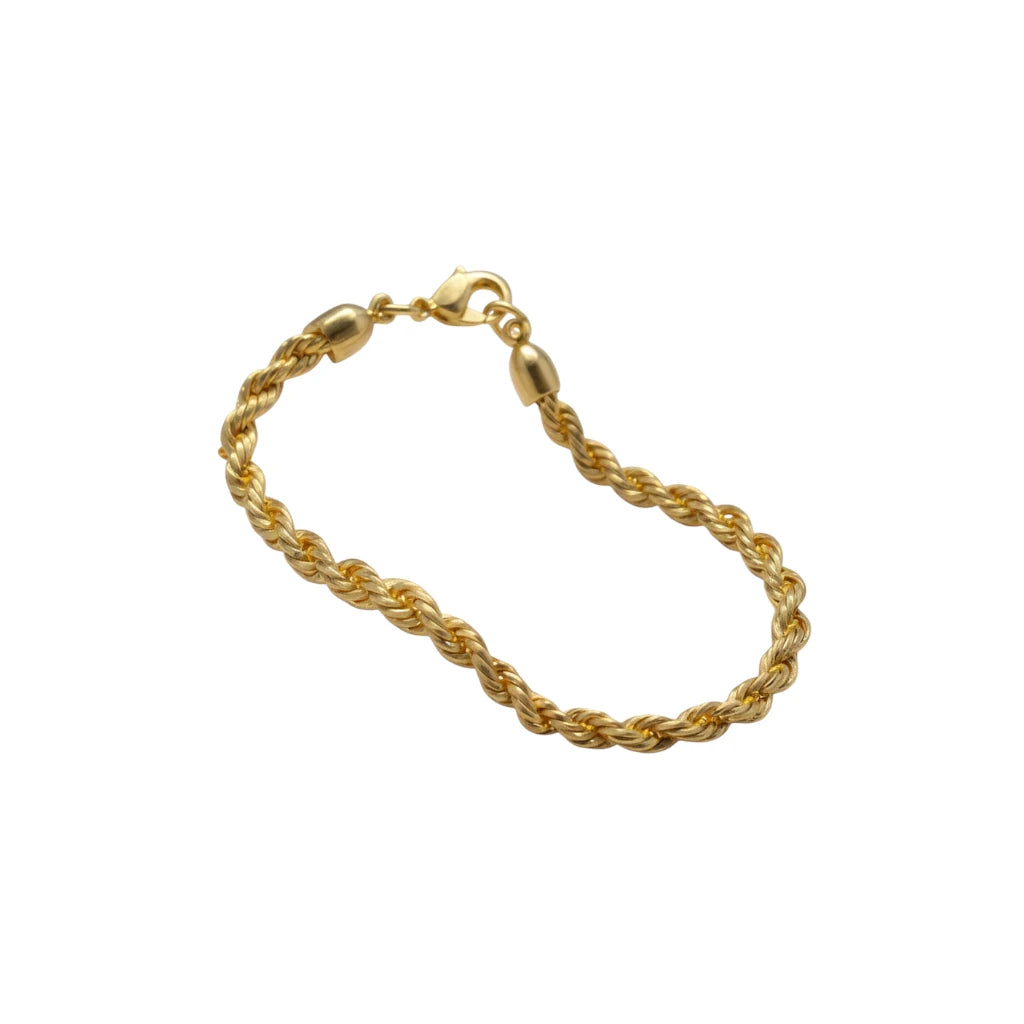 bracelet twist doré à l'or fin 24 carats sur fond blanc